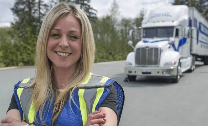 An image of a smiling woman and a Valley Driving School logo